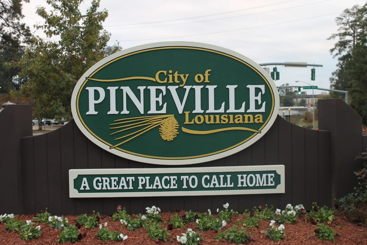 Welcome sign: city of pineville louisiana - a great place to call home